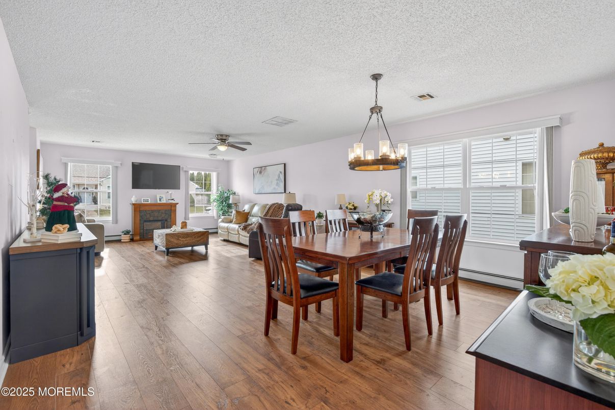 Dining room, Fireplace, Interior, Living room, Pendant Lights, Wood Texture Flooring