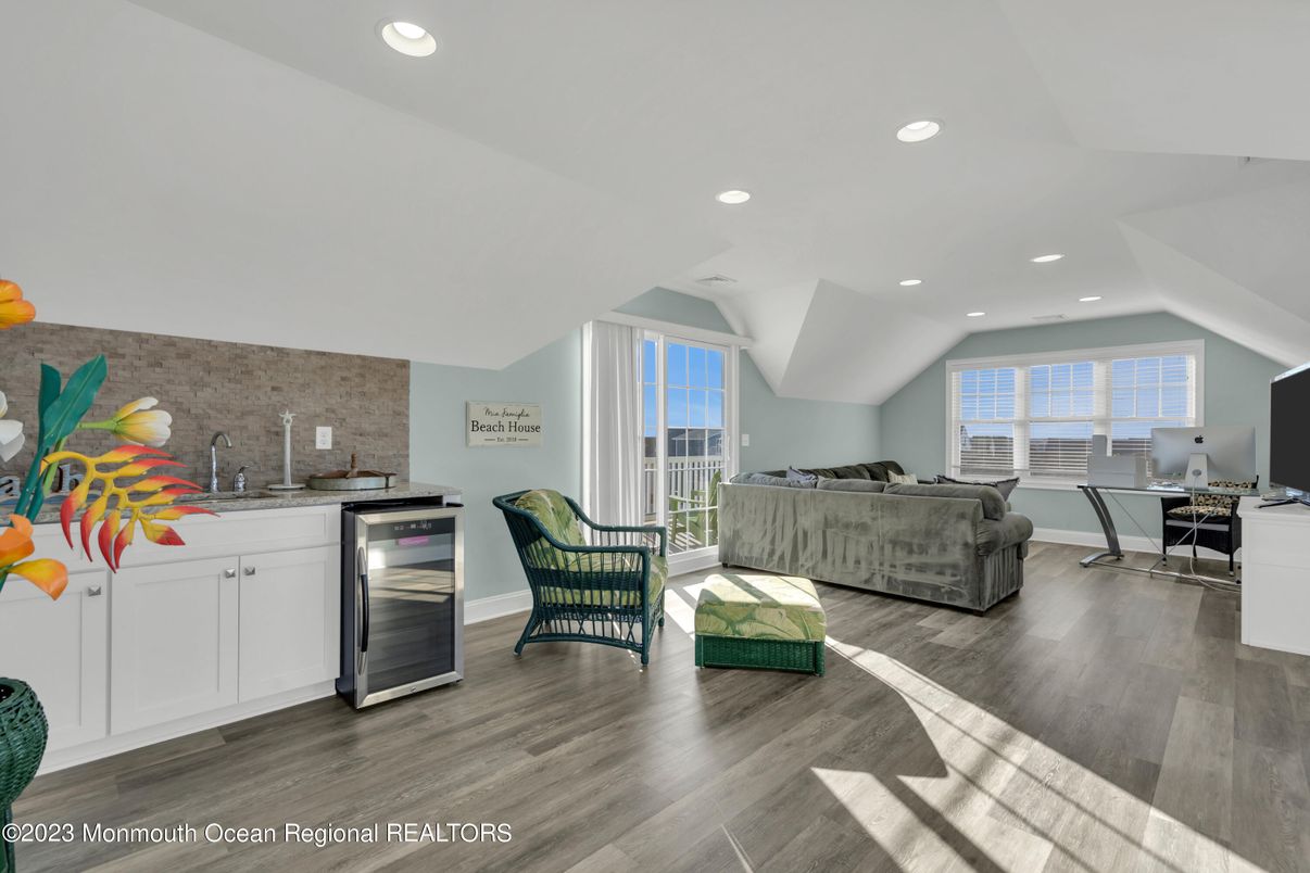 Dining room, Interior, Kitchen, Living room, Recessed Lighting, Stone Walls, Wood Texture Flooring