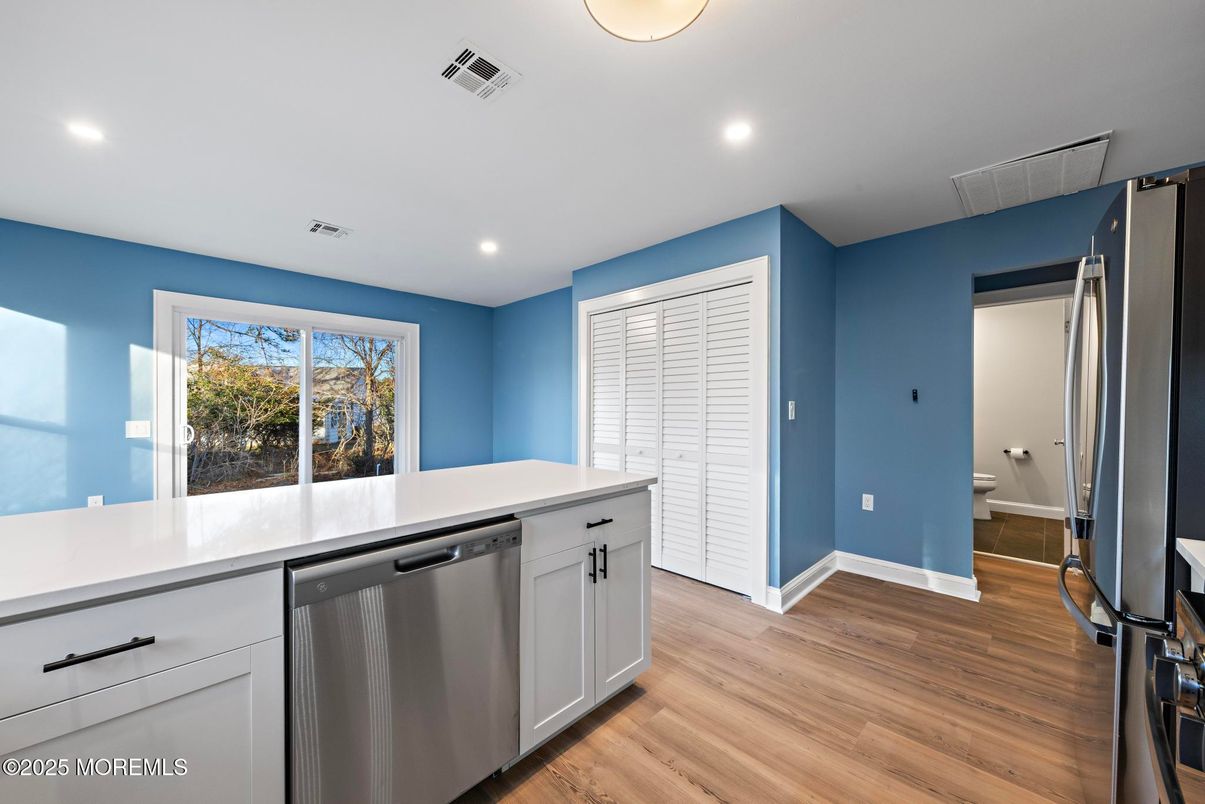 Interior, Kitchen, Recessed Lighting, Stainless Steel Appliances, Wood Texture Flooring