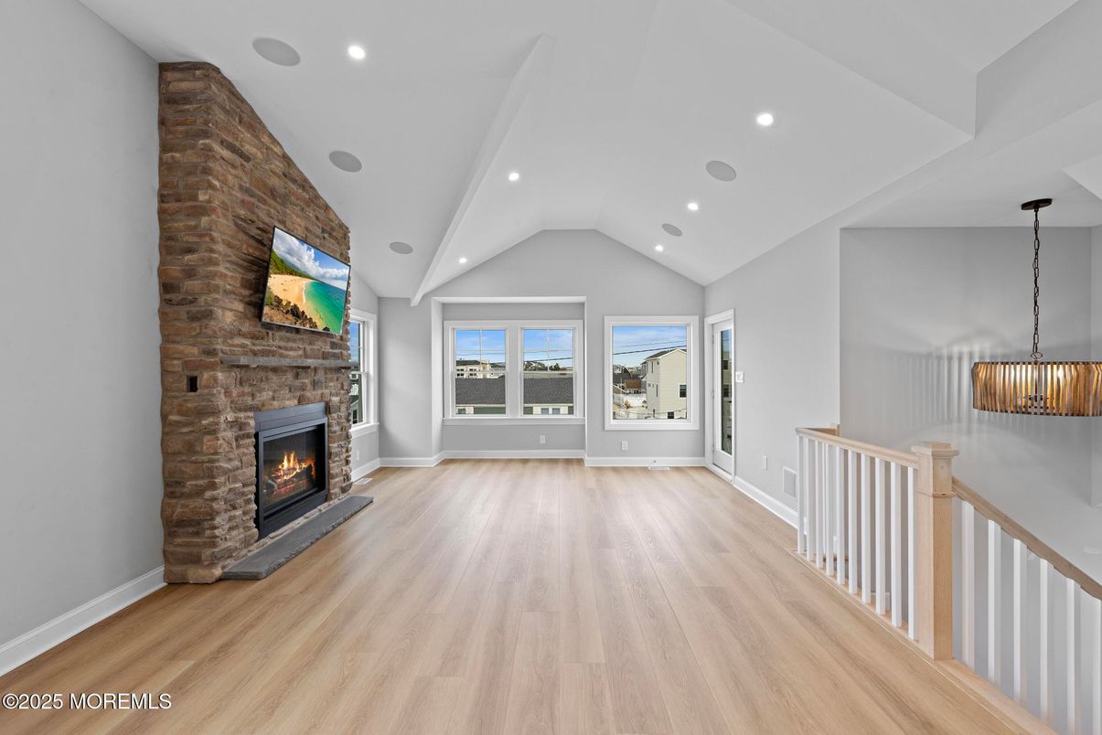 Fireplace, Interior, Pendant Lights, Recessed Lighting, Wood Texture Flooring