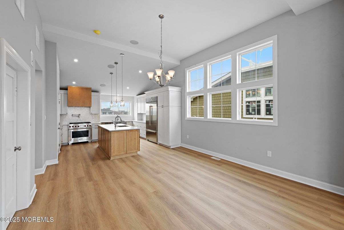 Chandelier, Interior, Kitchen, Pendant Lights, Recessed Lighting, Stainless Steel Appliances, Wood Texture Flooring