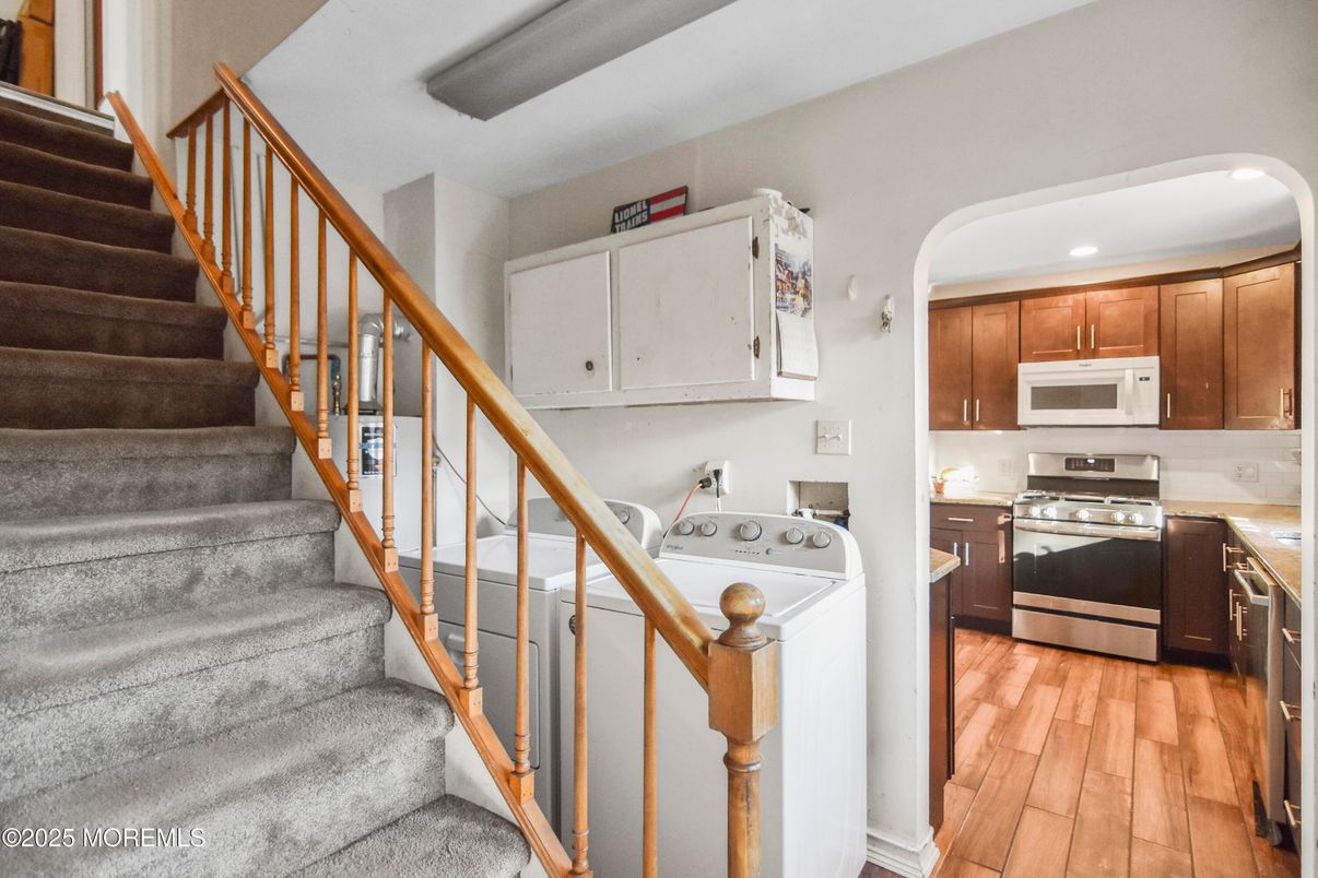 Interior, Kitchen, Recessed Lighting, Stainless Steel Appliances, Washer, Wood Texture Flooring