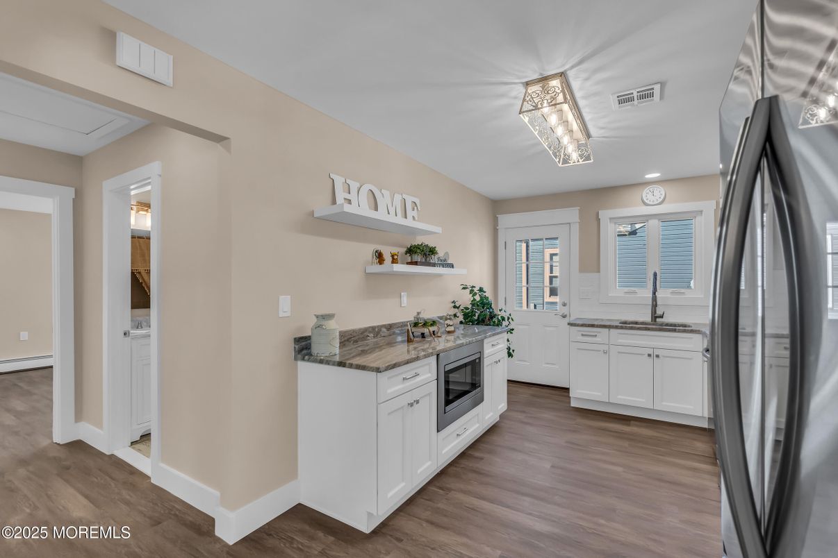 Interior, Kitchen, Recessed Lighting, Stainless Steel Appliances, Wood Texture Flooring