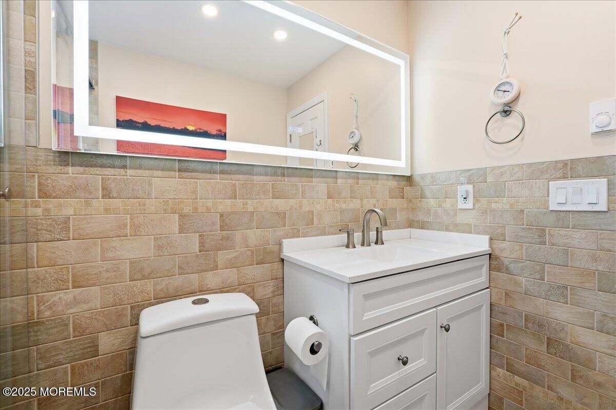 Bathroom, Fireplace, Interior, Recessed Lighting, Stone Walls