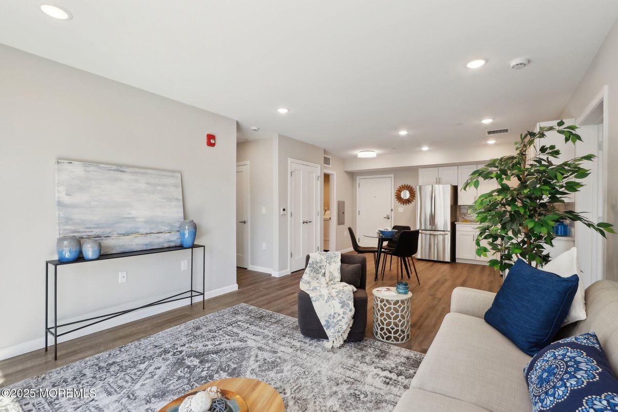 Dining room, Interior, Kitchen, Living room, Recessed Lighting, Stainless Steel Appliances, Wood Texture Flooring