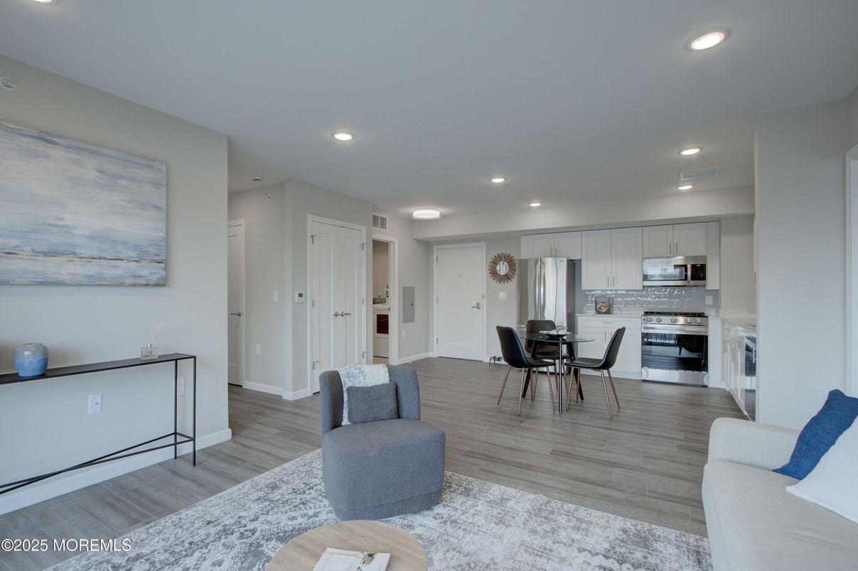 Dining room, Interior, Kitchen, Living room, Recessed Lighting, Stainless Steel Appliances, Wood Texture Flooring