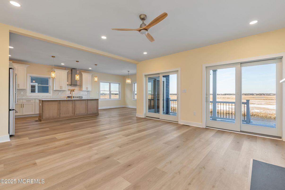 Empty room, Interior, Kitchen, Pendant Lights, Recessed Lighting, Water, Wood Texture Flooring
