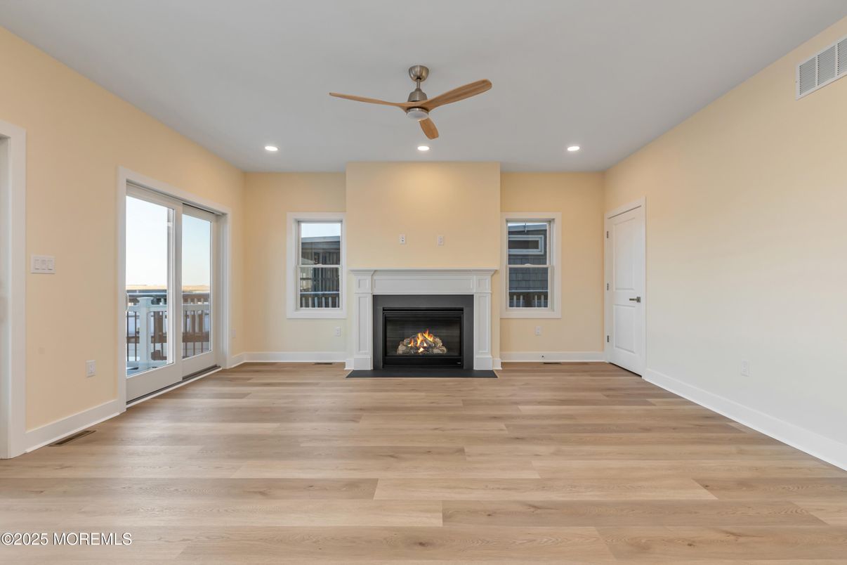 Empty room, Fireplace, Interior, Recessed Lighting, Wood Texture Flooring