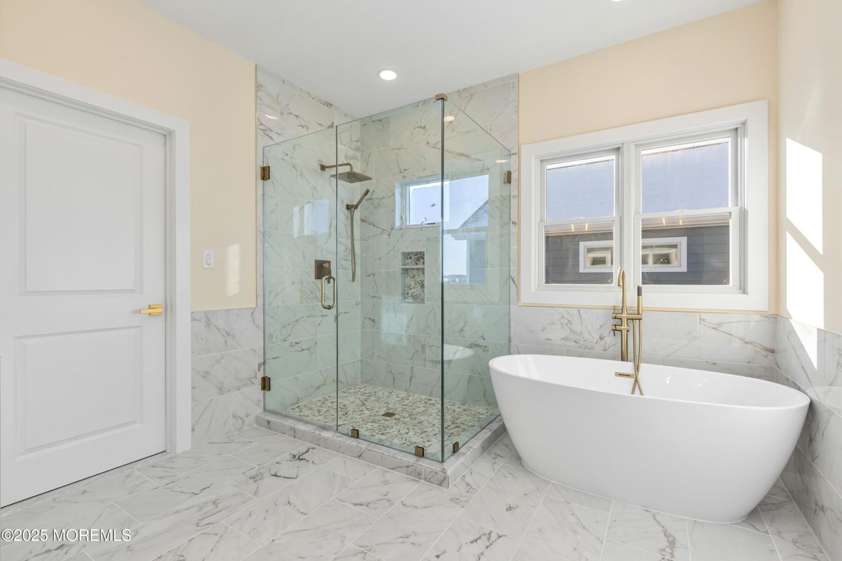 Bathroom, Free Standing Baths, Glass Shower, Interior, Marble, Marble Walls, Recessed Lighting