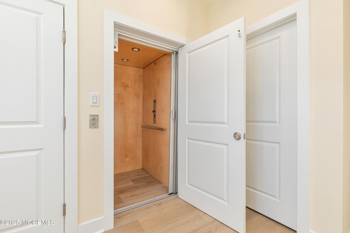 Elevator, Interior, Recessed Lighting, Wooden Ceilings, Wood Texture Flooring, Wooden Walls