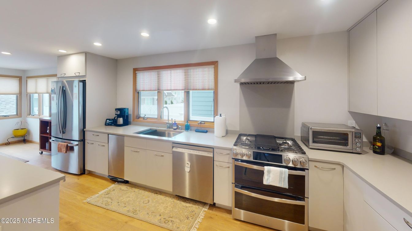 Interior, Kitchen, Recessed Lighting, Stainless Steel Appliances, Wood Texture Flooring