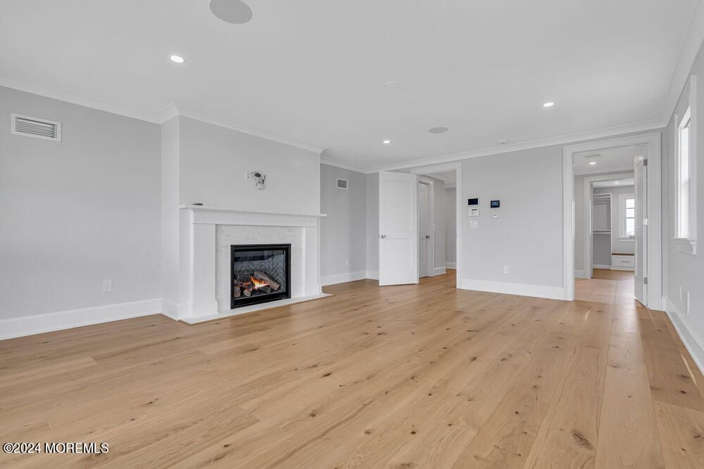 Empty room, Fireplace, Interior, Recessed Lighting, Wood Texture Flooring