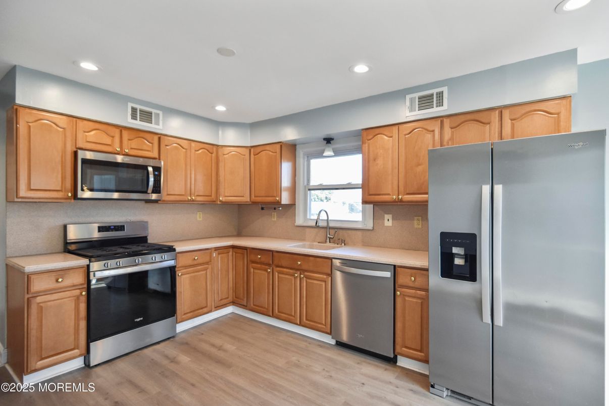 Interior, Kitchen, Recessed Lighting, Stainless Steel Appliances, Wood Texture Flooring