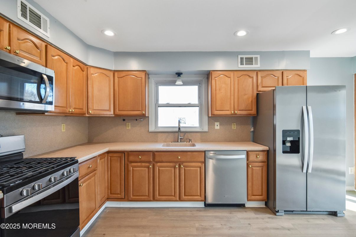 Interior, Kitchen, Recessed Lighting, Stainless Steel Appliances, Wood Texture Flooring