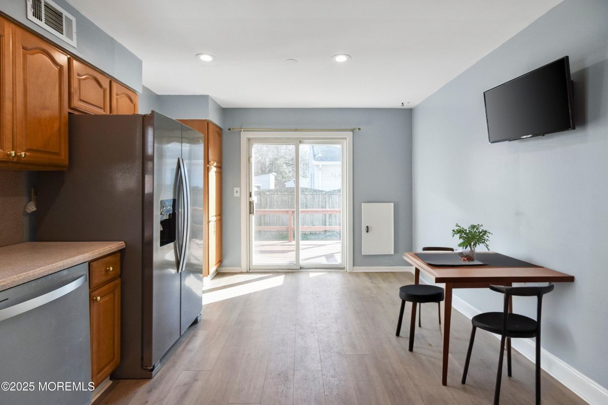 Dining room, Interior, Kitchen, Recessed Lighting, Stainless Steel Appliances, Wood Texture Flooring
