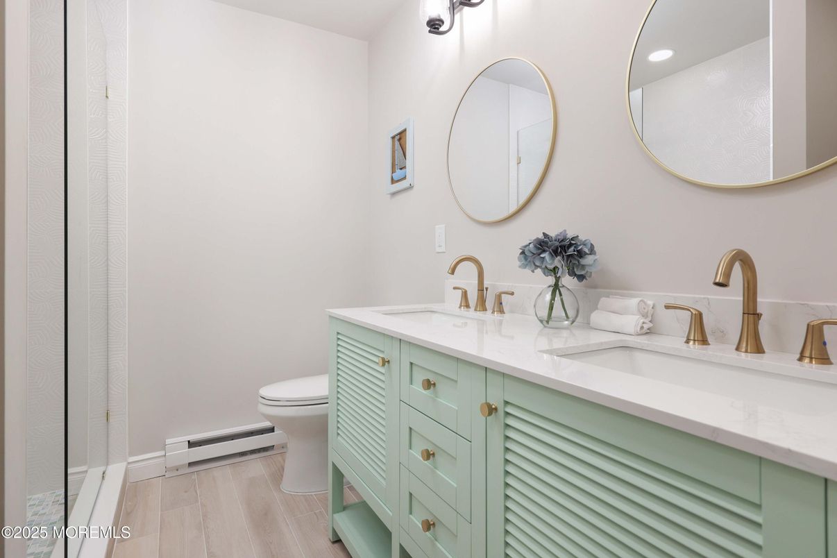 Bathroom, Dual Sink Vanities, Interior, Recessed Lighting, Wood Texture Flooring