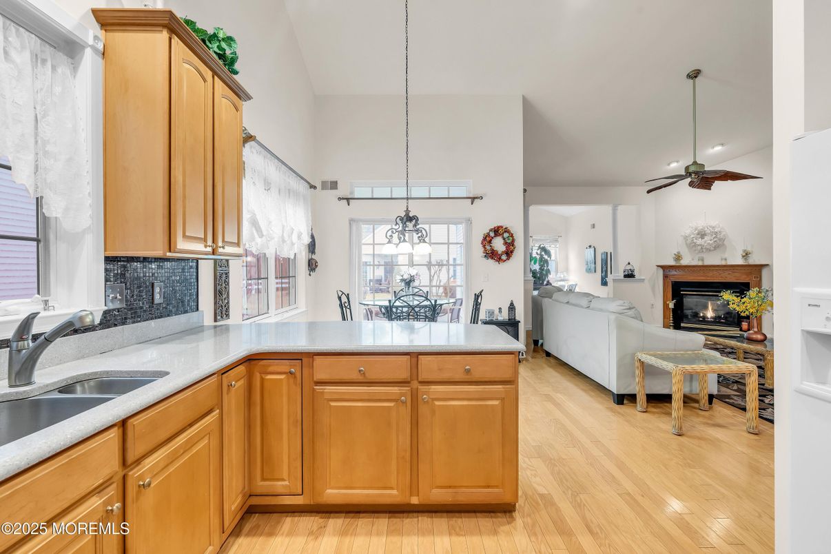 Dining room, Fireplace, Interior, Kitchen, Living room, Pendant Lights, Recessed Lighting, Wood Texture Flooring