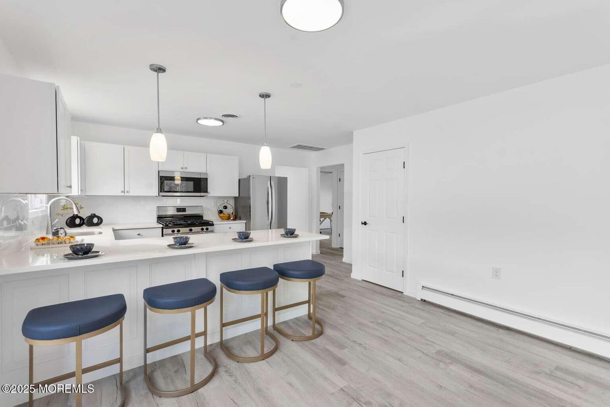 Interior, Kitchen, Pendant Lights, Stainless Steel Appliances, Wood Texture Flooring