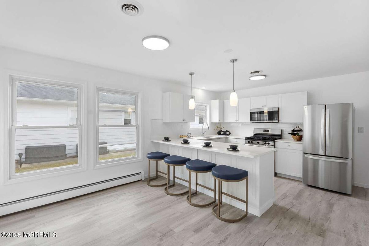 Interior, Kitchen, Pendant Lights, Stainless Steel Appliances, Wood Texture Flooring