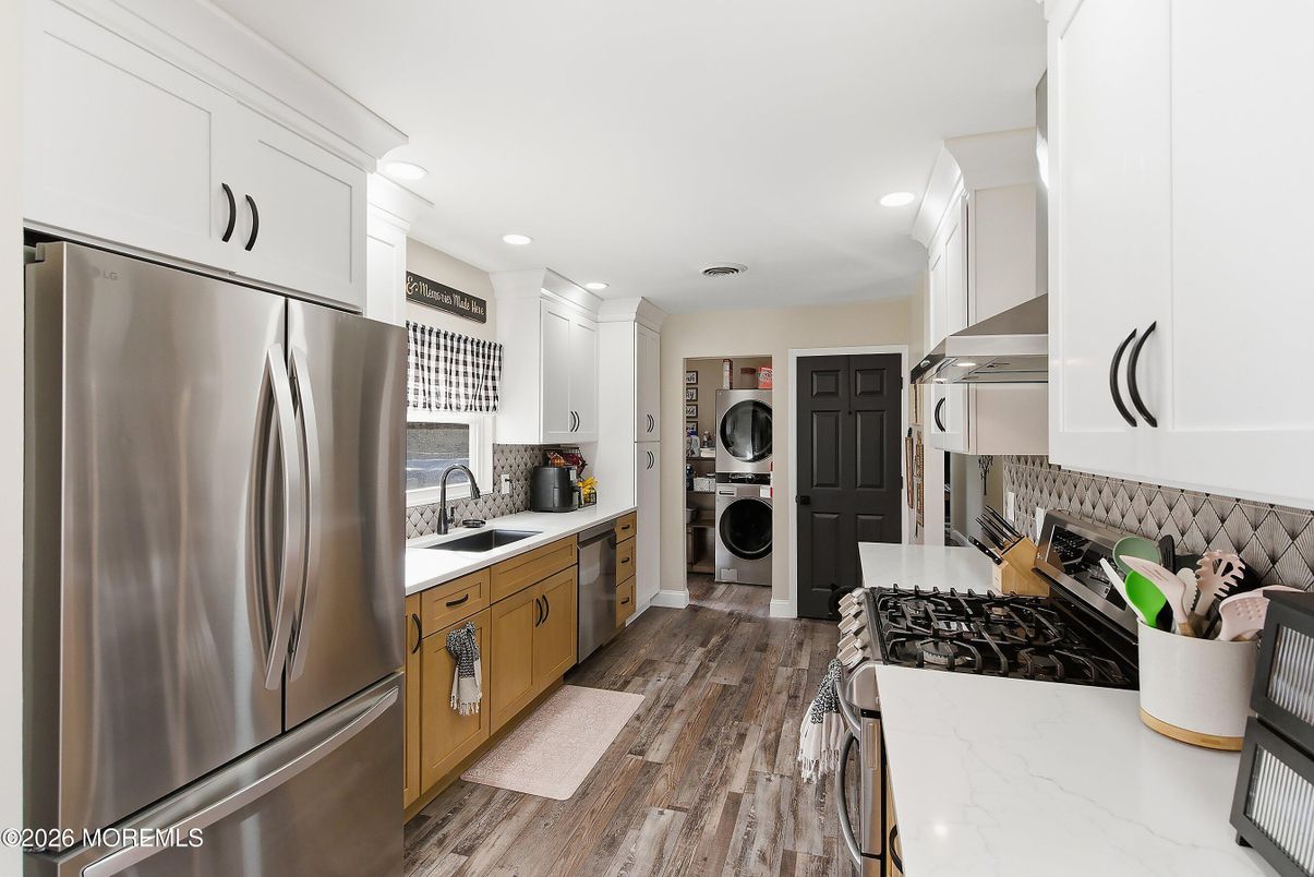 Interior, Kitchen, Recessed Lighting, Stainless Steel Appliances, Washer, Wood Texture Flooring