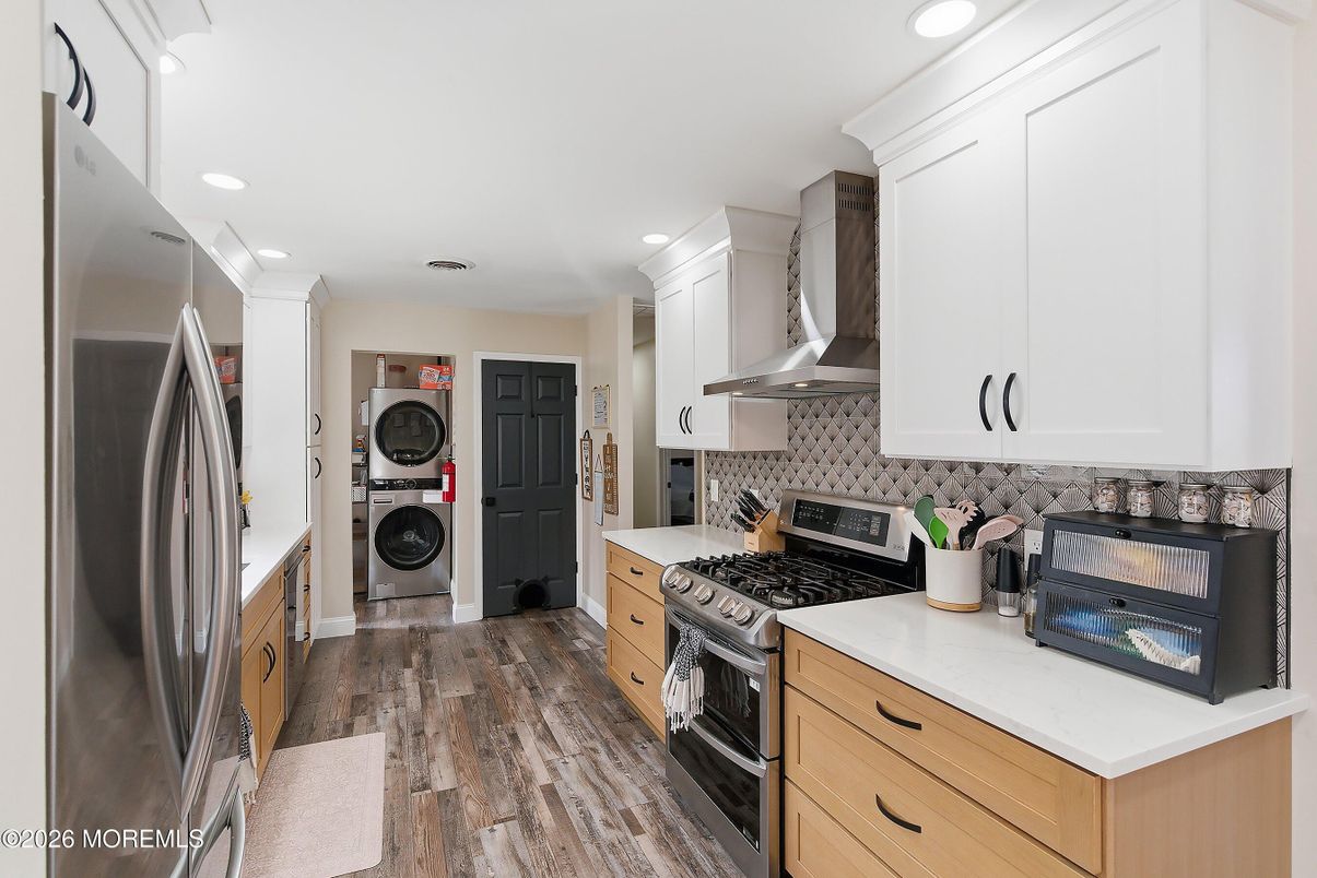Interior, Kitchen, Recessed Lighting, Stainless Steel Appliances, Washer, Wood Texture Flooring