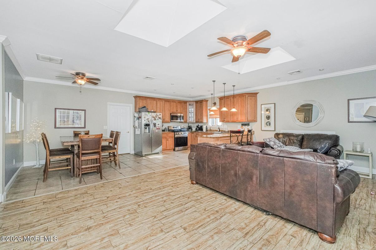Dining room, Interior, Kitchen, Living room, Pendant Lights, Stainless Steel Appliances, Wood Texture Flooring