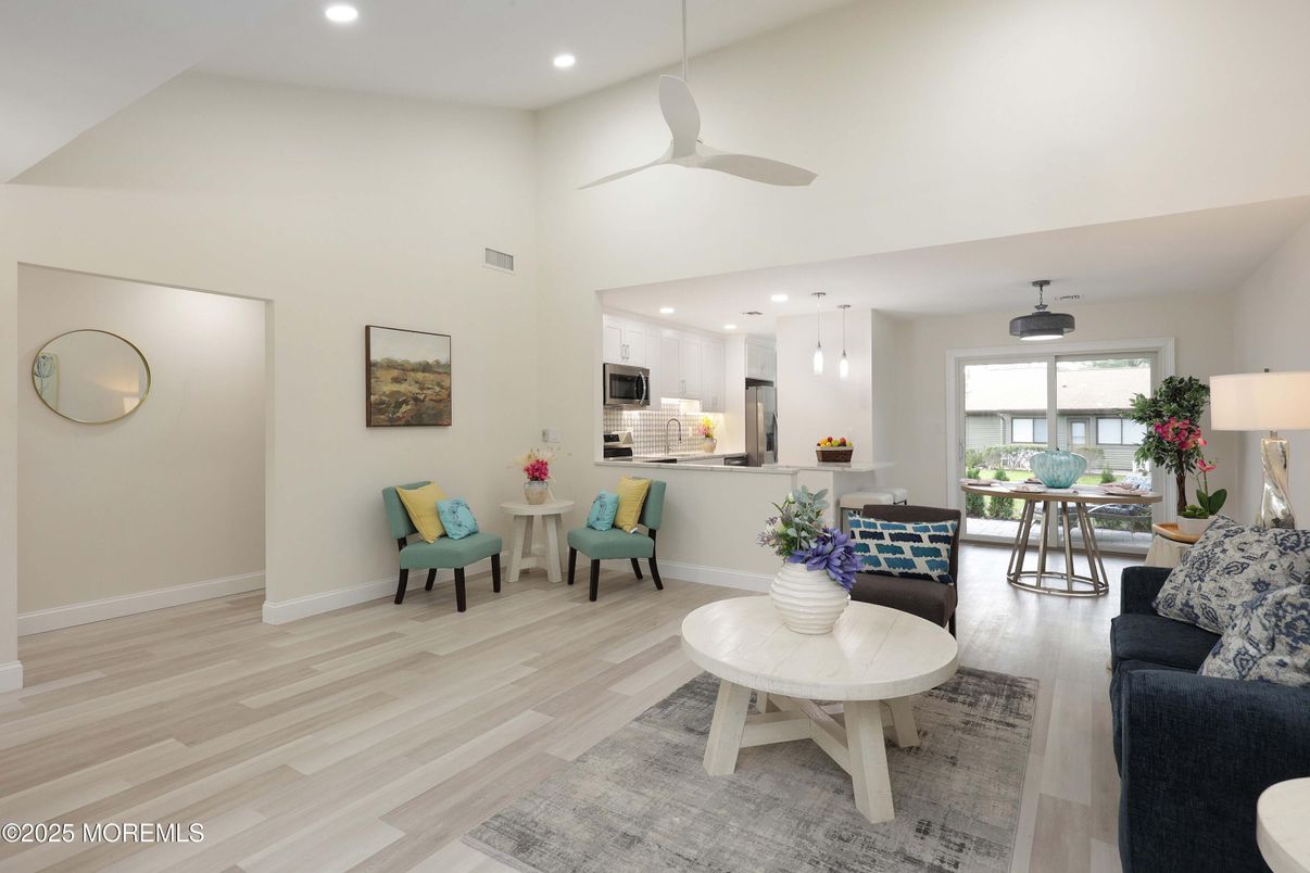 Dining room, Interior, Kitchen, Living room, Pendant Lights, Recessed Lighting, Stainless Steel Appliances, Wood Texture Flooring