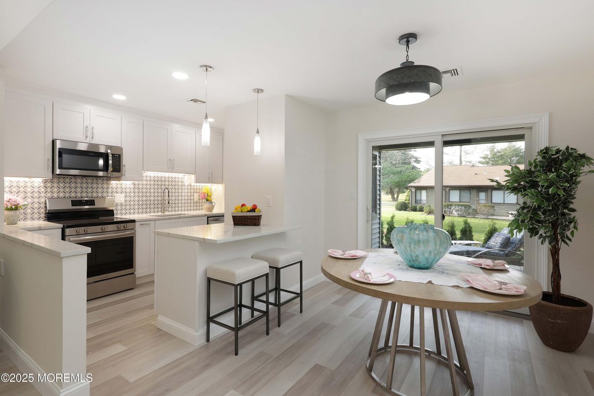 Interior, Kitchen, Pendant Lights, Recessed Lighting, Stainless Steel Appliances, Wood Texture Flooring