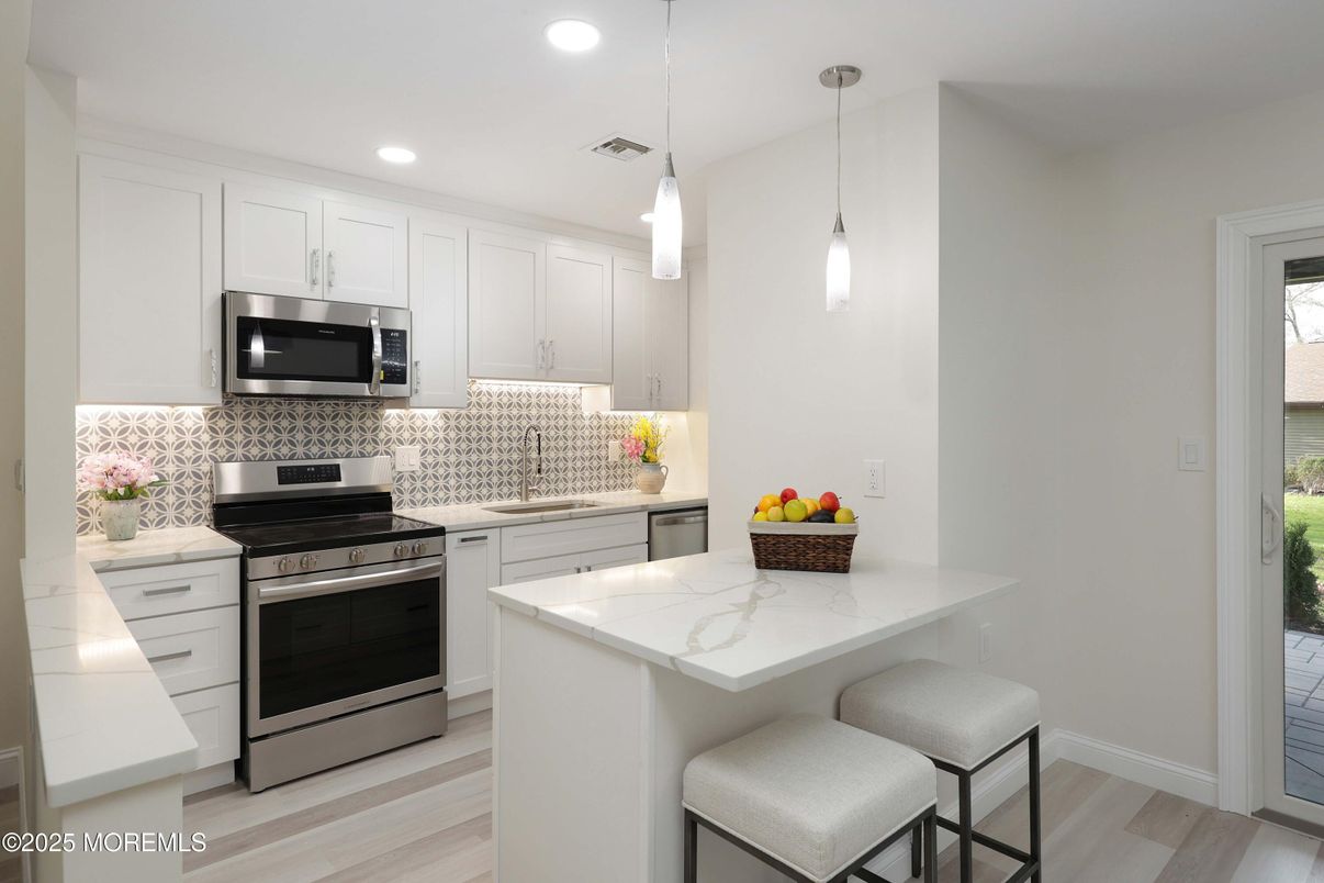 Interior, Kitchen, Pendant Lights, Recessed Lighting, Stainless Steel Appliances, Wood Texture Flooring