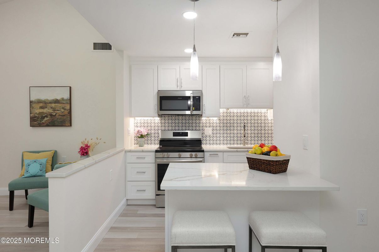 Interior, Kitchen, Pendant Lights, Recessed Lighting, Stainless Steel Appliances, Wood Texture Flooring