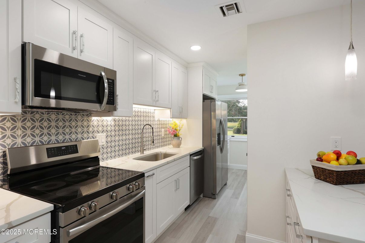 Interior, Kitchen, Pendant Lights, Recessed Lighting, Stainless Steel Appliances, Wood Texture Flooring