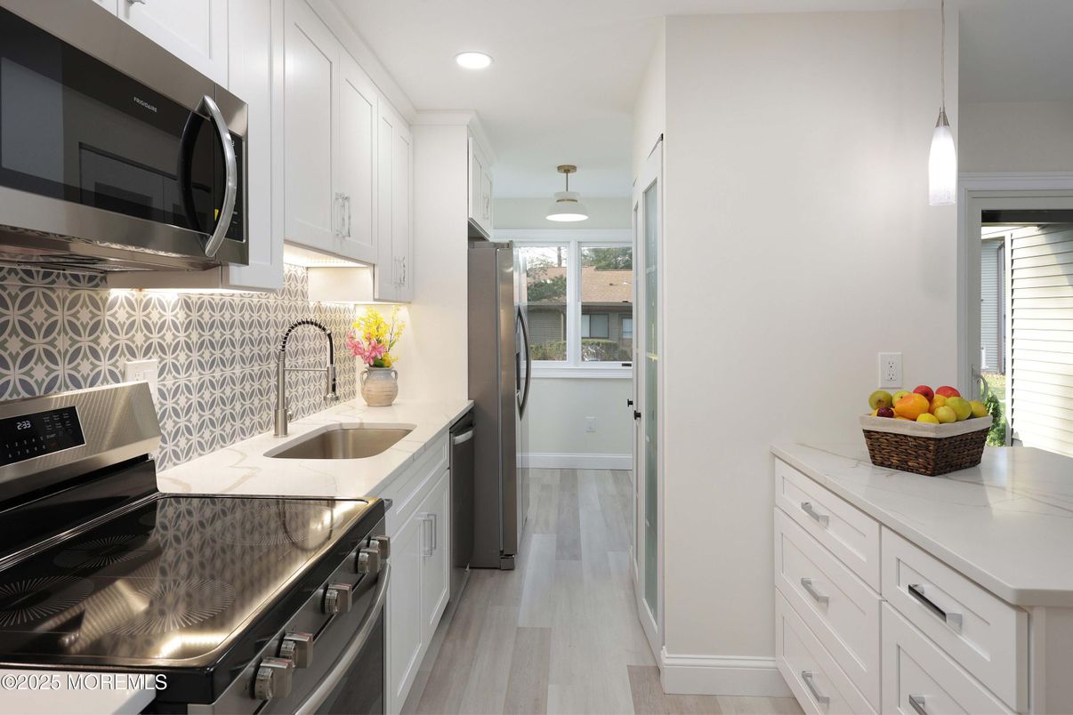 Interior, Kitchen, Pendant Lights, Recessed Lighting, Stainless Steel Appliances, Wood Texture Flooring