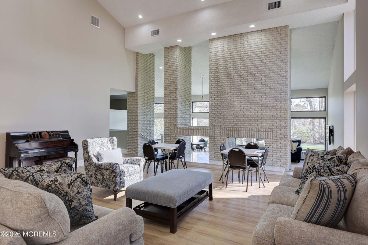 Dining room, Interior, Living room, Piano, Recessed Lighting, Stone Walls, Wood Texture Flooring