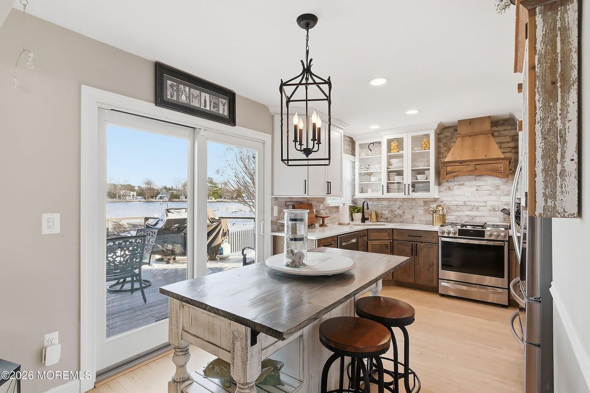 Interior, Kitchen, Pendant Lights, Recessed Lighting, Stainless Steel Appliances, Water, Wood Texture Flooring