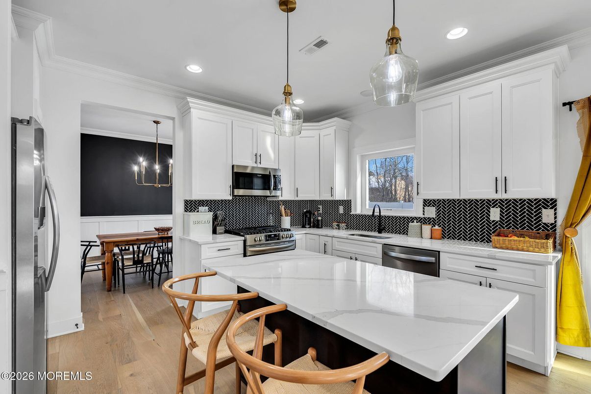 Dining room, Interior, Kitchen, Pendant Lights, Recessed Lighting, Stainless Steel Appliances, Wood Texture Flooring