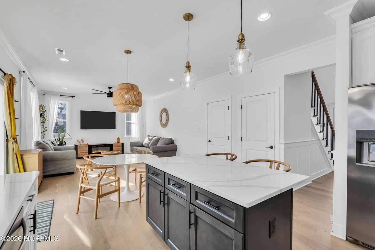 Dining room, Interior, Kitchen, Living room, Pendant Lights, Recessed Lighting, Stainless Steel Appliances, Wood Texture Flooring