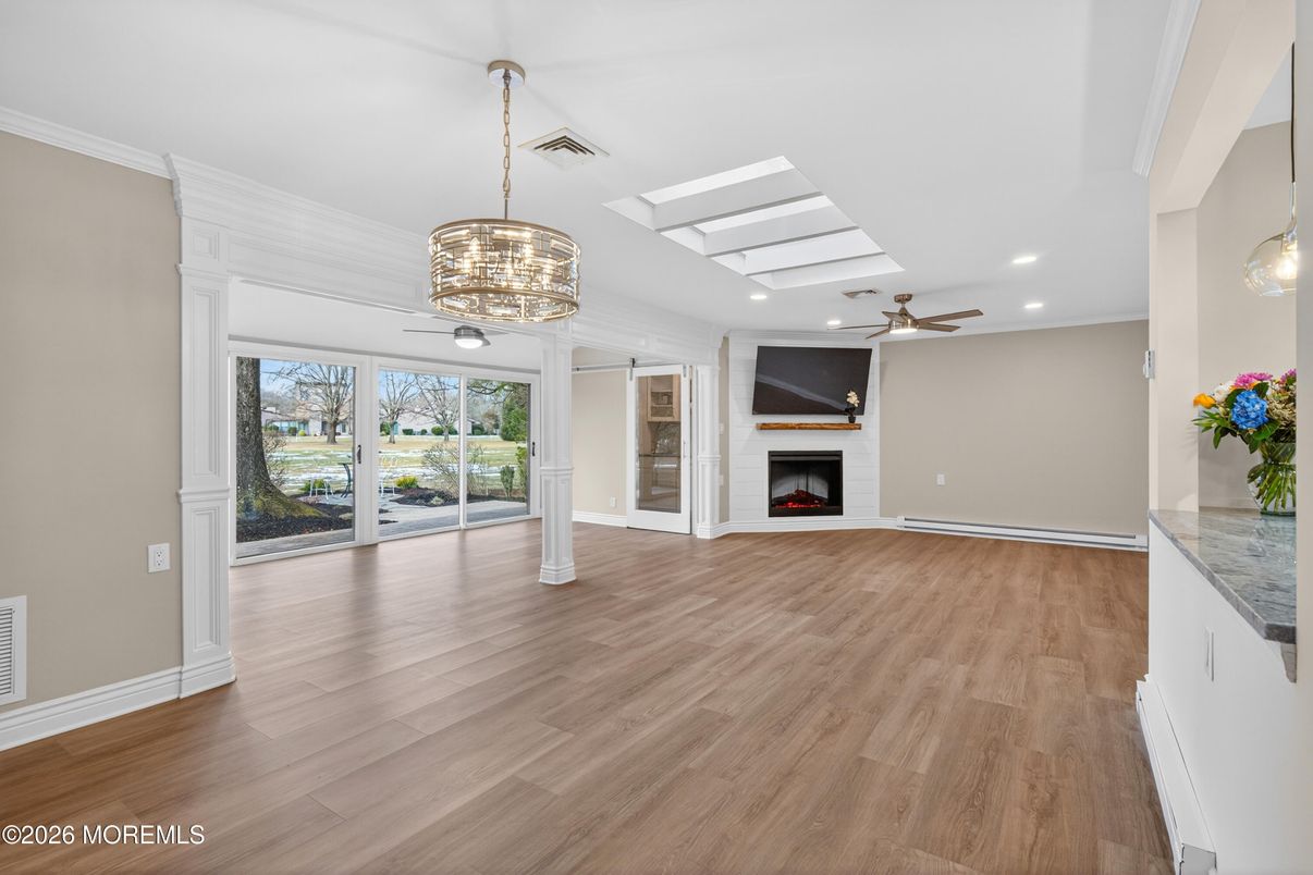 Empty room, Fireplace, Interior, Pendant Lights, Recessed Lighting, Wood Texture Flooring