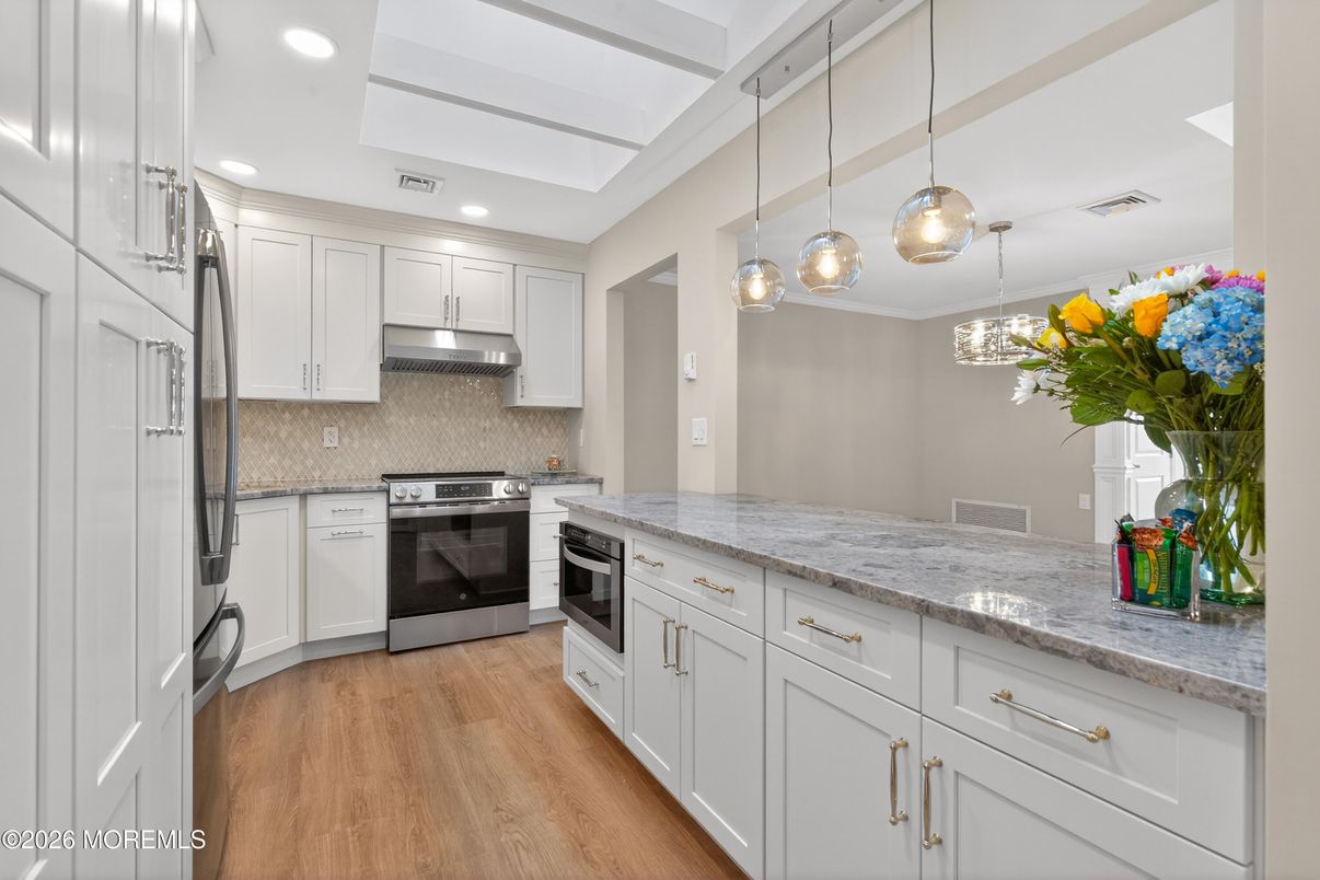 Interior, Kitchen, Pendant Lights, Recessed Lighting, Stainless Steel Appliances, Wood Texture Flooring