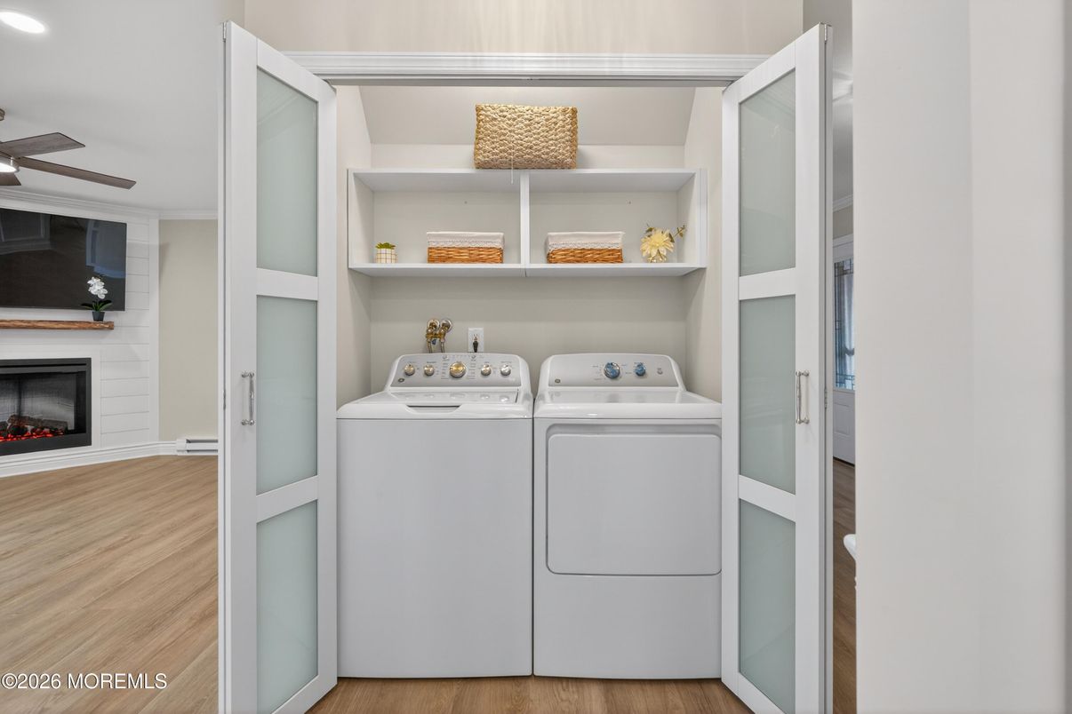 Fireplace, Interior, Recessed Lighting, Utility Closets, Washer, Wood Texture Flooring