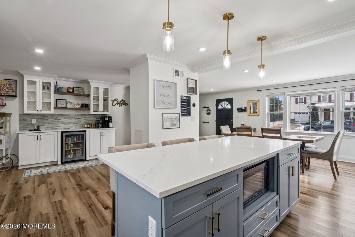 Dining room, Fireplace, Interior, Kitchen, Pendant Lights, Recessed Lighting, Wood Texture Flooring