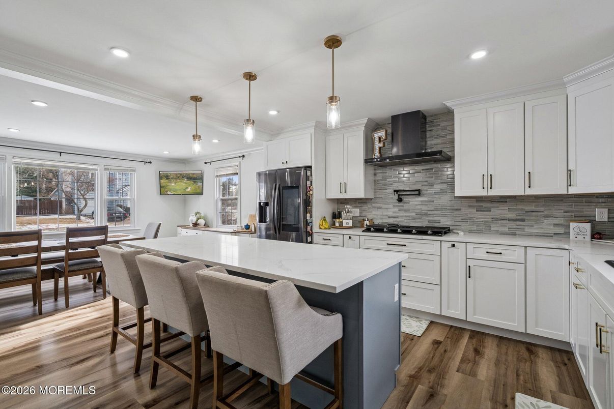 Dining room, Interior, Kitchen, Pendant Lights, Recessed Lighting, Stainless Steel Appliances, Wood Texture Flooring