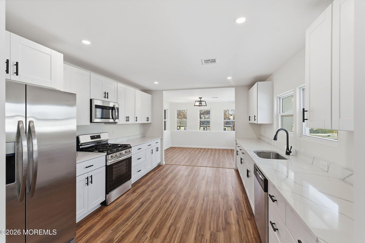 Interior, Kitchen, Recessed Lighting, Stainless Steel Appliances, Wood Texture Flooring