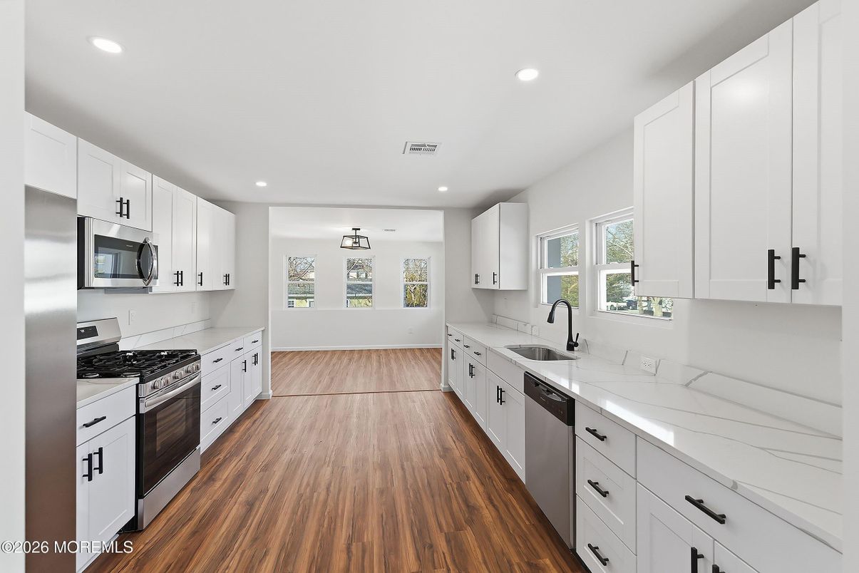 Interior, Kitchen, Recessed Lighting, Stainless Steel Appliances, Wood Texture Flooring