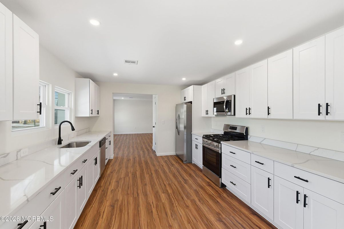 Interior, Kitchen, Recessed Lighting, Stainless Steel Appliances, Wood Texture Flooring