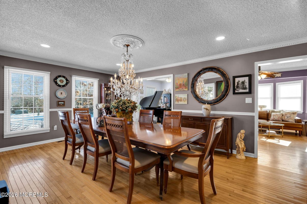 Chandelier, Dining room, Interior, Living room, Piano, Recessed Lighting, Wood Texture Flooring