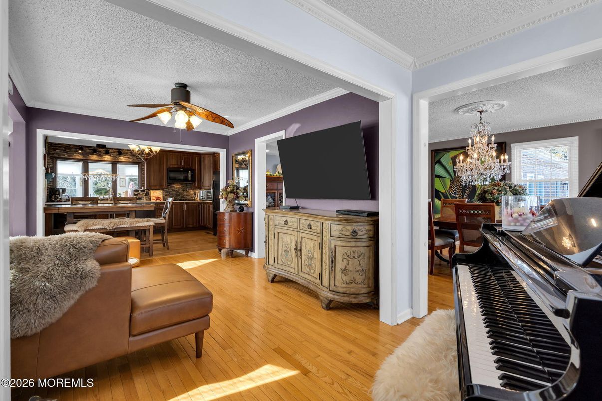 Chandelier, Dining room, Interior, Piano, Wood Texture Flooring