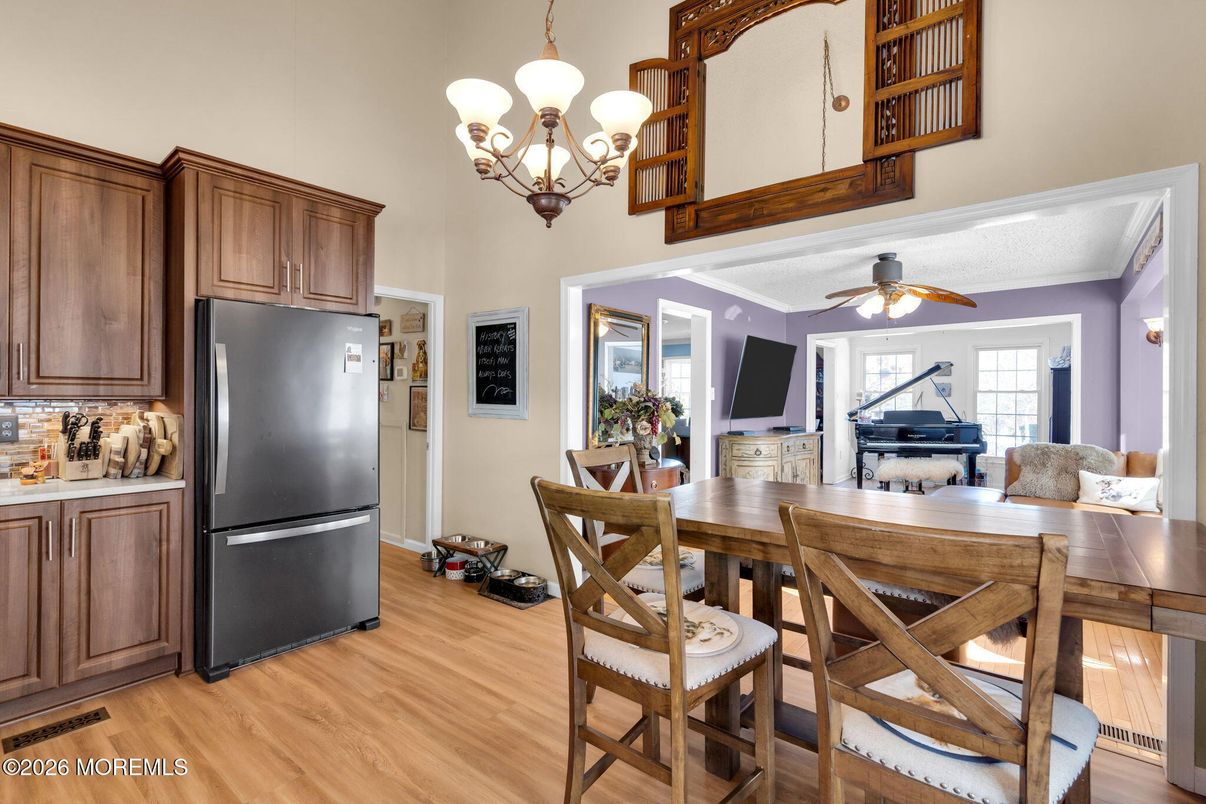 Chandelier, Dining room, Interior, Kitchen, Piano, Wood Texture Flooring