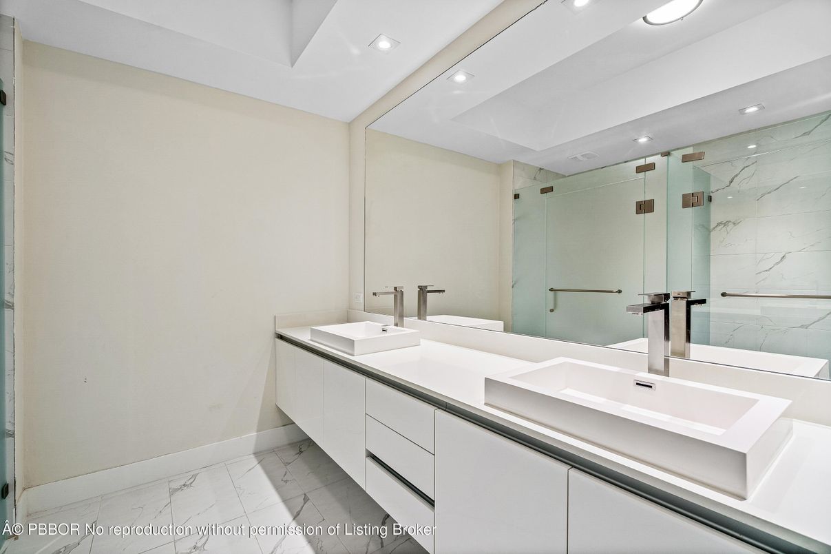 Bathroom, Dual Sink Vanities, Glass Shower, Interior, Marble, Marble Walls, Recessed Lighting