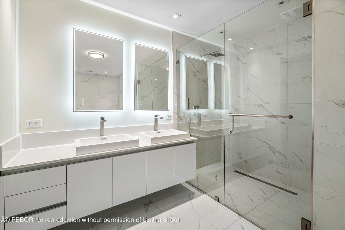Bathroom, Dual Sink Vanities, Glass Shower, Interior, Marble, Marble Walls, Recessed Lighting