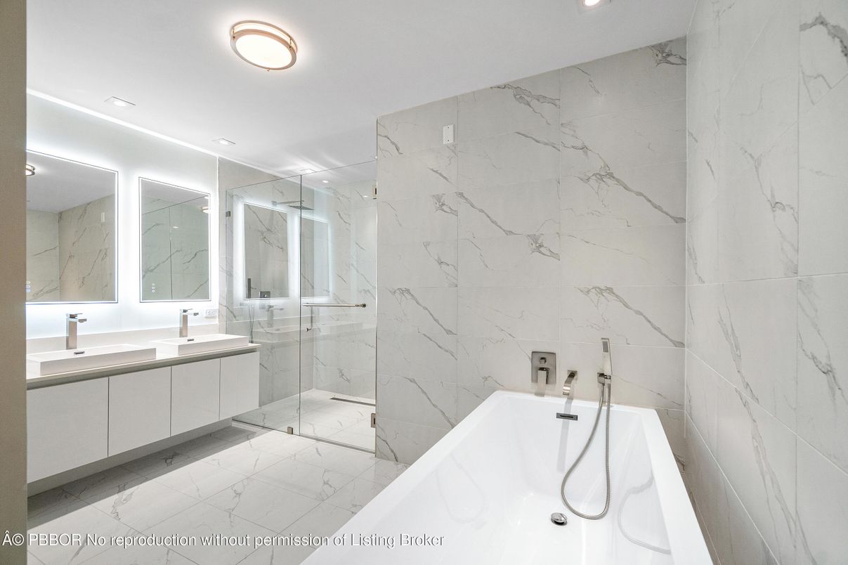 Bathroom, Dual Sink Vanities, Glass Shower, Interior, Marble, Marble Walls, Recessed Lighting